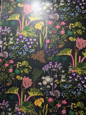 Adorable bathroom wallpaper at Giving Tree Cafe in Phoenix