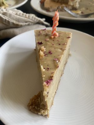 Cake with a candle for my birthday   at Giving Tree Cafe in Phoenix