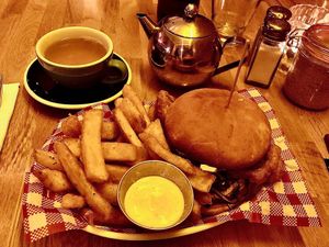 Cod burger with fries at Mockingbird in Wellington