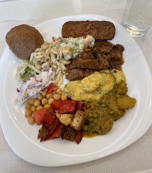 Several different salads and proteins, all vegan! And unlimited housemade bread rolls.   at Kring - Center in Sofia