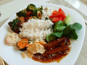 My favorite was the carrot sushi and cold tofu salad (lower left). at Kring - Center in Sofia