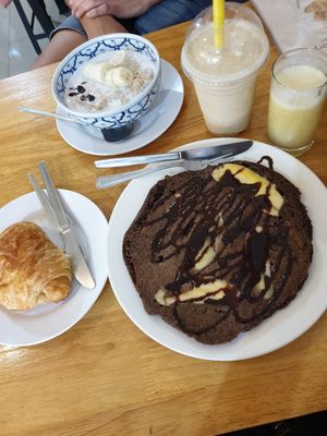 Vegan banana chocolate pancake, vegan chocolate Croissant, vegan oatmea&pineapple juice and oatmeal shake at Da's Home Bakery in Chiang Mai