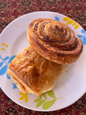 50 baht each - chocolate croissant and flaky cinnamon bun, both made with puff pastry. at Da's Home Bakery in Chiang Mai