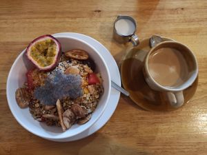 Muesli with Soy Yoghurt and fruits with coffee plus soy milk at Da's Home Bakery in Chiang Mai