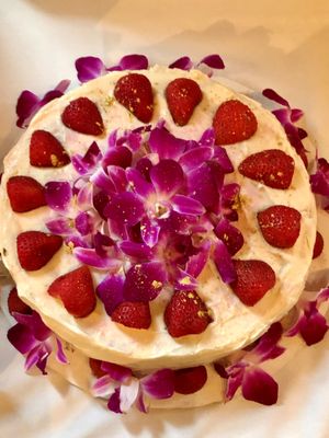 Baby Shower Vanilla Cake filled with buttercream & strawberries and topped with edible flowers (gluten-free) at Healing 4 The Soul in Hasbrouck Heights