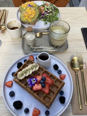 Two vegan waffles and avocado toast at The Kind Coconut in Mechelen