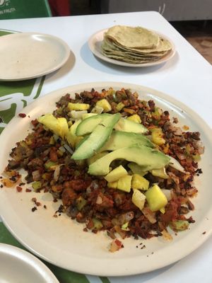 This was called No Que No and was a big mix of meats, cheese, pineapple, avocado, etc. and a bunch of tortillas  at El Veganito Mixe in San Luis Potosi