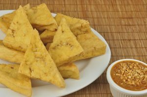 Fried Tofu - non-GMO Extra Firm Tofu wedges served with Vegan Pacific Thai Peanut Sauce. at Pacific Thai in Santa Cruz