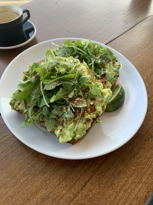 This avo toast is a double order, shared between two. at Captain + Stoker in Monterey