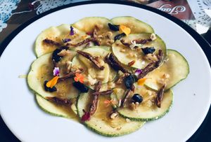 Zucchini carpaccio with edible flowers at Joapira in El Hierro