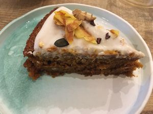 Vegan carrot cake with coconut frosting at Manna Porto in Porto