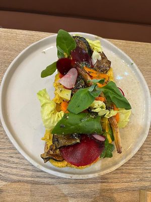 Bread loaded with veggies  at Manna Porto in Porto