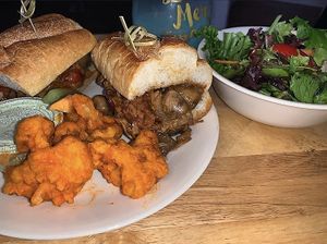 Jackfruit cheesesteak w/ a side salad and cauliflower buffalo bites at Northern Soul in Hoboken
