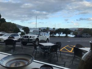 View from our table across the harbour at Careys Bay Historic Hotel in Dunedin