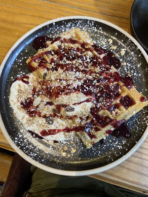 Breakfast spiced fruit and cinnamon infused granola waffles with cherry coulis   at The Waffle House in Norwich