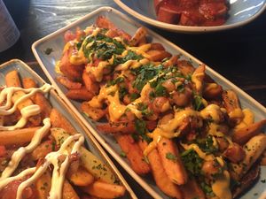 Fancy french fries & currywurst at Pommes Pervers in Essen