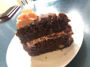 Turkish delight cake with beautiful pink striped icing and a layer of actual TD!  at Tom's Diner in Banbury