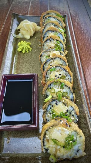 Hurricane Roll tempura grilled asparagus, avocado, soy ginger tofu de jalapeno plum glaze  at Pacific Coast Grill in Cardiff