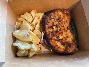 Reuben sandwich and chips. On Saturdays they have savory specials like this   at Sweet Soul Bakery in St James
