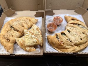 Spicy chicken mushroom calzone, garlic bread, pepperoni and veggie calzonee  at Pie in the Sky in Baltimore