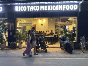 One of three names on front of same restaurant   at The Long Bridge in Tam Coc