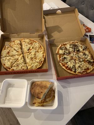 Vegan Hawaiian, meat lovers & garlic bread  at ZigZag Pizzeria in Modbury