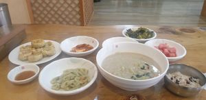 Soy bean noodle soup,  mandu , and banchans at Hae Tteuneun in Gwangju