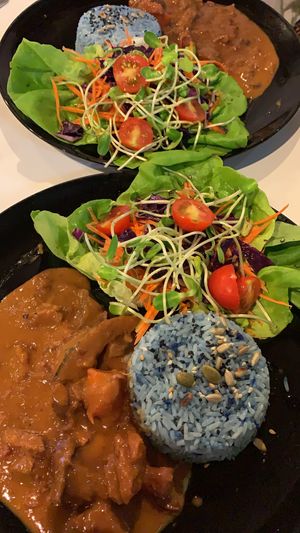 Massaman curry with pea flower jasmine rice and salad at Street Vegan House in Koh Phangan