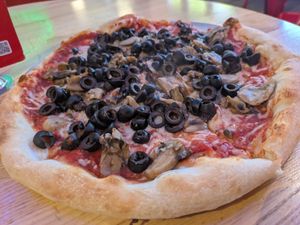 Vegan mushroom + olive pizza! at Ian's Pizza on State in Madison