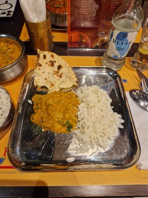 Main dish (Bhindi Masala) with Okra in a creamy tomato sauce served with rice. 
Additional roti bread. at Krishna Vilas in Utrecht