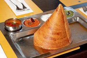 Dosa - Rice and lentil pancake, thin and crispy, served with tiffin sambar and varieties of chutney at Krishna Vilas in Utrecht