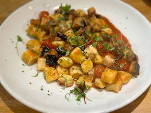 Gnocchi alla Norma Vegani: Homemade Potato Dumplings/Roasted Eggplant/Cherry Tomatoes/San Marzano Tomato Sauce at Piazza 1909 in La Jolla