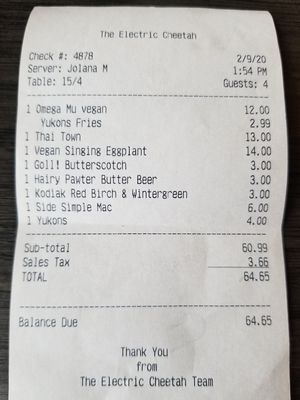 Family of four at The Electric Cheetah in Grand Rapids