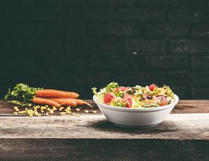 Salada da Horta: 100% Vegan. Mistura de alfaces, milho, cenoura, tomate, cebolinho, pepino em conserva, azeite e vinagre. at The Good Burger in Porto