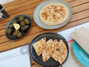 Stuffed vine leaves, pita, green pie with Cretan greens at Cafe12 in Crete