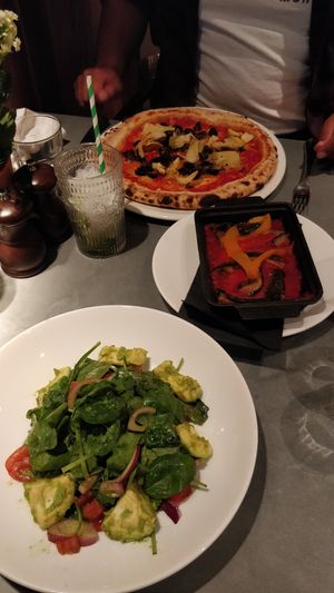 Vegan pizza, salad and extra veggies at The Beech House in Richmond Upon Thames