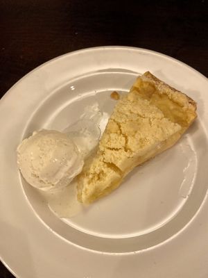 Vegan apple custard tart with vanilla ice cream at Pendle Witch in Lancaster