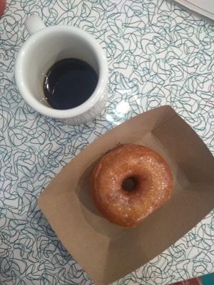 Fresh vegan donut and coffee at Angelhearts Donuts in Ithaca