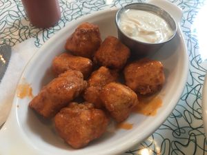 Buffalo Bites! SOOO SCRUMPTIOUS! served with housemade blue cheez or ranch! at Angelhearts Donuts in Ithaca