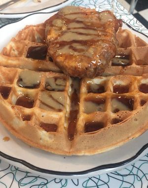 Chik'nWaffles smothered in gravy and maple syrup Mmmmmm at Angelhearts Donuts in Ithaca
