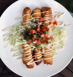 Green chili chikken flautas with cashew sour cream  at Dead Beet Eats in Kansas City
