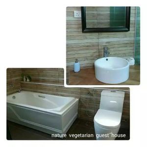 bathroom at family suite at Nature Vegetarian Guest House in Malacca