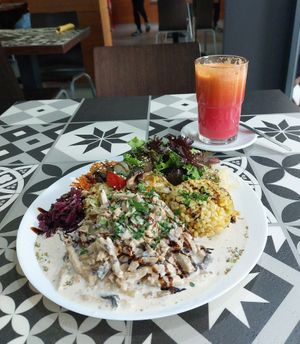 Stroganoff with seitan, rice, salad  and fresh juice at Vegan Story in Lisbon