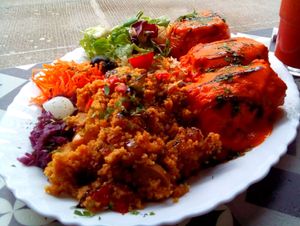 3 meals in 1 dish: millet stuffed tomato, cabbage rolls and paella at Vegan Story in Lisbon