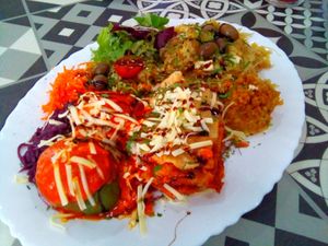 4 dishes: vegan bacalhau à braz, risotto, tomato-zuchinni & lasagna at Vegan Story in Lisbon