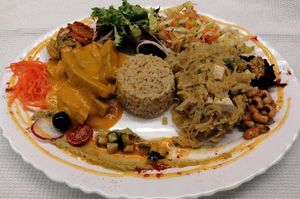 Seitan com molho de cenoura e Tofu à brás at Vegan Story in Lisbon