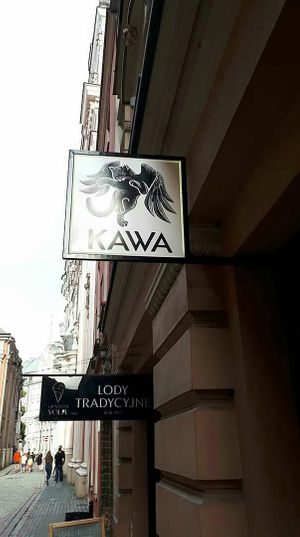 Sign at the door at Kawa in Poznan