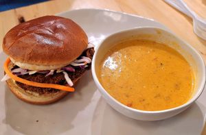 Spicy crabcake sandwich and smokey Corn bisque at Veggie Grill by Next Level in Cambridge