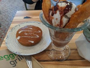 Churro sundae and pumpkin spice cake at Veggie Grill by Next Level in Cambridge