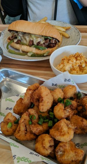 Beyond cheese steak, crispy cauliflower with orange sauce, and mac and cheese at Veggie Grill by Next Level in Cambridge